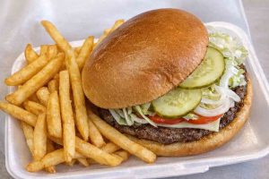 1/2 Lb. Cheeseburger Deluxe with Fries & Drink